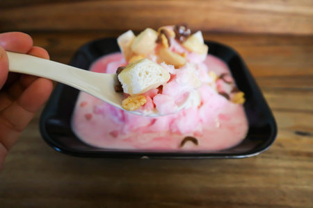 shave ice, shaved ice or snowflake ice with bread and raisinの写真素材