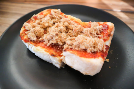 toast with butter and dried pork topping or bread toastの写真素材