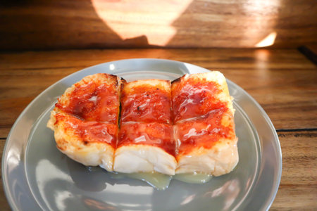 toast with butter and strawberry jam topping or bread toastの写真素材