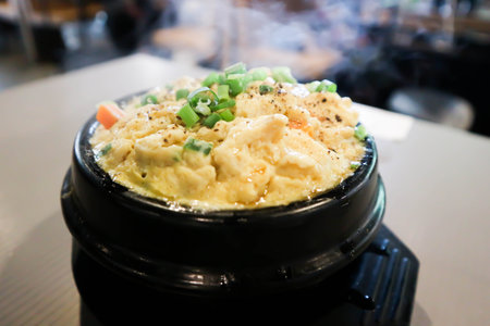 steamed egg with green onion and pepper toppingの写真素材