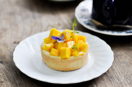 mango cake or mango cheese cake , mango cheese pie with mango toppingの写真素材