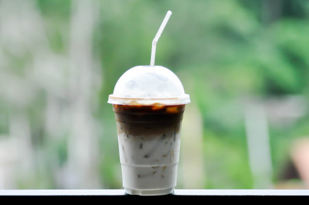 iced coffee , iced latte coffee or iced cappuccino coffee in plastic glassの写真素材