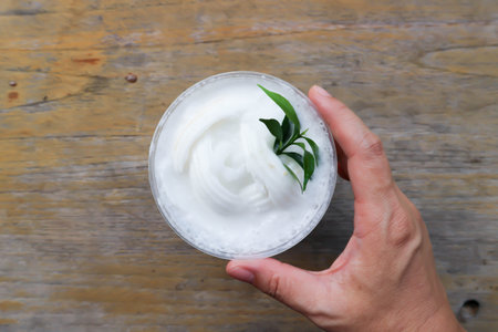 coconut smoothie or coconut juice , coconut milk in plastic glassの写真素材