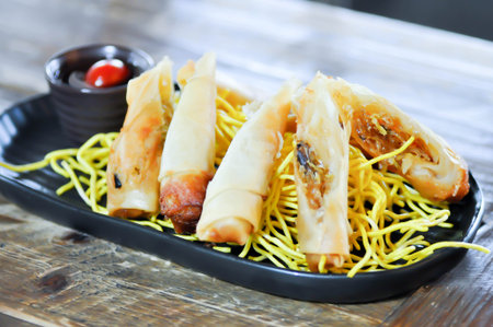 spring rolls, deep fried rolls or vermicelli rolls or deep fried Spring rolls or fried Spring rolls and dipの写真素材