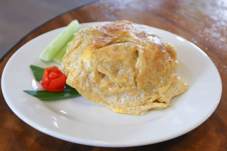 omelette, omelet or deep fried egg and rice or Thai omeletteの写真素材