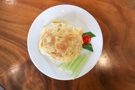 omelette, omelet or deep fried egg and rice or Thai omeletteの写真素材