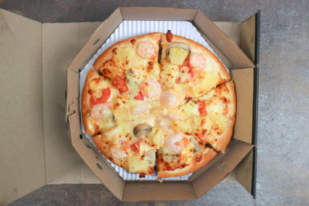 a box of pizza ,shrimp pizza or seafood pizzaの写真素材