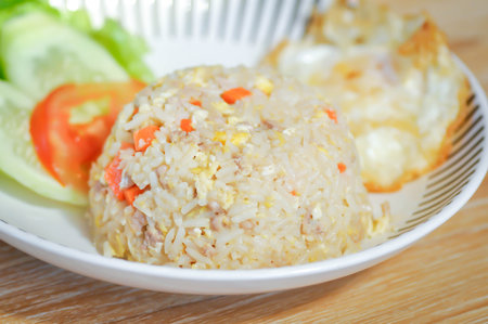 stir fried rice or fried rice with sunny side up egg or fried eggの写真素材