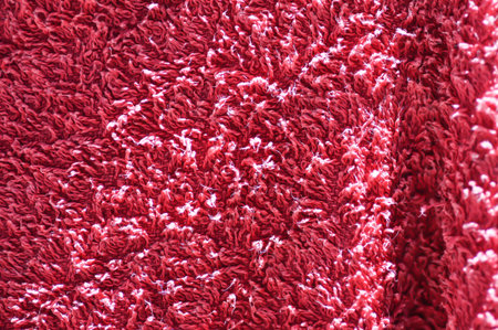 old red towel, old napkin or old red hand towel or red footmatの写真素材