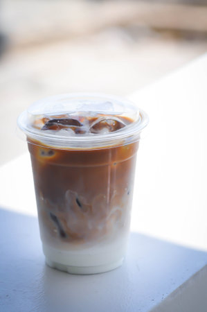 iced coffee , iced latte coffee or iced cappuccino coffee in plastic glassの写真素材