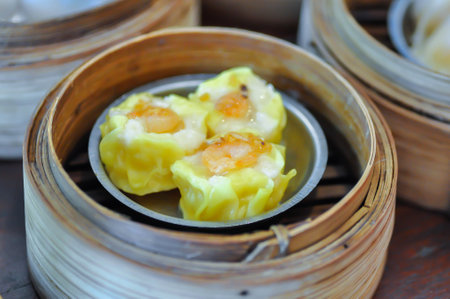 steamed shrimp ball , Chinese steamed dumpling or dim sum or Chinese dumpling in the small basketの写真素材