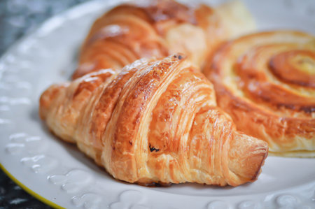 croissant ,French croissant or chocolate croissant or French bread and danish or danish pastry dish