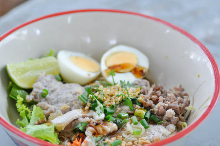 Chinese noodles with pork and eggl or noodles without soup or plain noodles or noodles salad