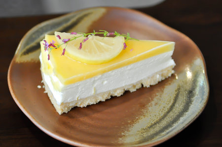 lemon cheese cake or lemon cheese pie or lemon cake with lemon toppingの写真素材