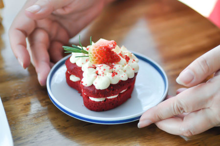red velvet cake with strawberry topping or a piece of cake or small cake for serve