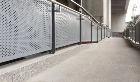 Diagonal perspective of the tiled floor along with grilleの写真素材