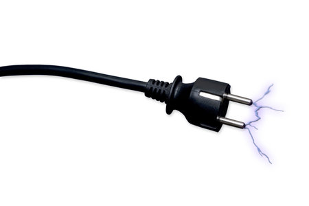 Short circuit, Black power plug on a white backgroundの写真素材