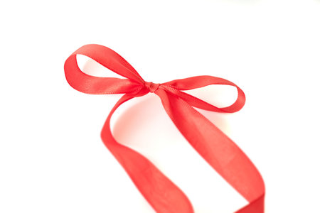 Red wrapping tape, isolated in front of white backgroundの写真素材