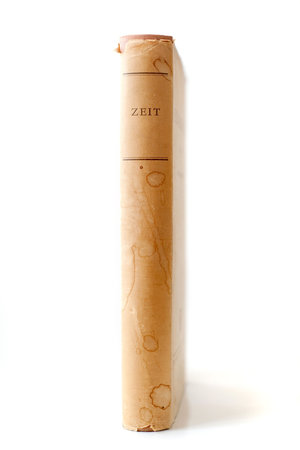 Old book with the title 'Zeit' on white backgroundの写真素材