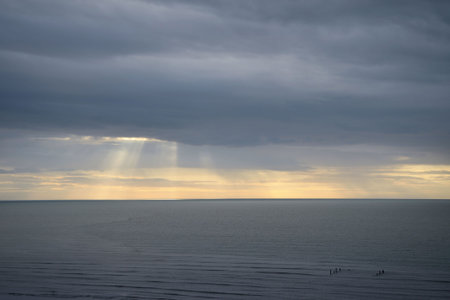 Evening mood by the sea with nice sunset の写真素材