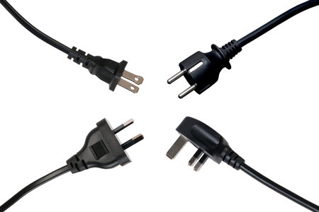 Four black power plugs, isolated on white background