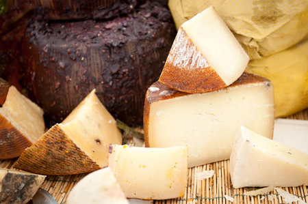 Different sorts of Italian cheese at a marketの写真素材