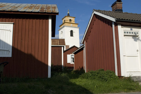 the church of Gammelstad in the backgroundの写真素材