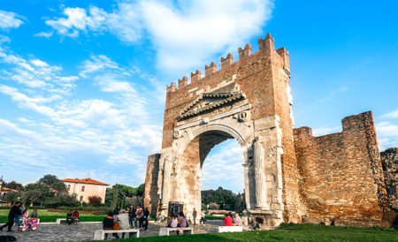 Rimini, Italy - september 23, 2012: Ancient Arco D'Augusto (arch of Augustus). This is northern Italyâs oldest surviving triumphal arch, marking the entrance to Rimini for travellersのeditorial素材