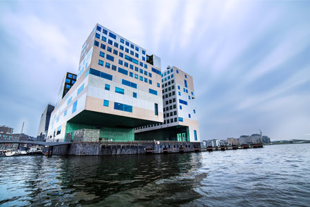 Amsterdam, Netherlands - SEPTEMBER 5, 2014: Palace of Justice by Claus en Kaan Architecten view from Amstel river.のeditorial素材