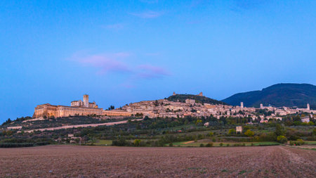 Panoramic landscape. Assisi Italy Basilica of St. Francis at sunset. Sunset amazing viewの写真素材