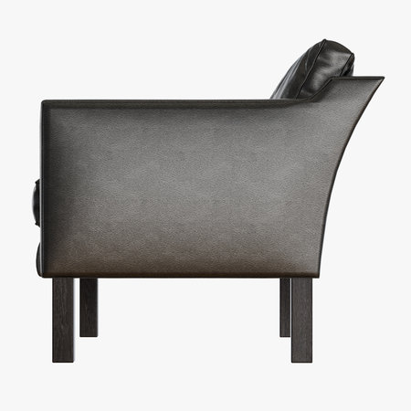Soft black leather armchair view from the side 3d renderingの写真素材