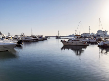 Pleasure boat floats from the pier and lucky people on the tour. Sochi 04.28.2019のeditorial素材