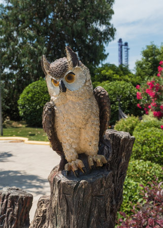 Carved statuette of owl wood in the park Russia Sochi 06 22 2019のeditorial素材