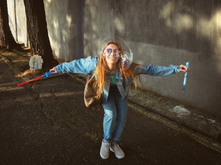 Girl and a big soap bubble near her face