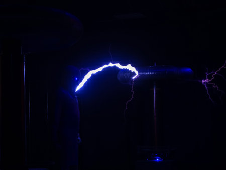 The figure of a man with luminous eyes, struck by lightning in the shoulder from electric coils,...