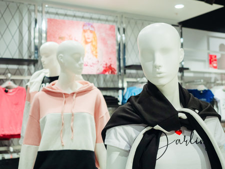 Sochi, Russia - 14 December 2019. White mannequin with a jacket tied around his neck in the store...