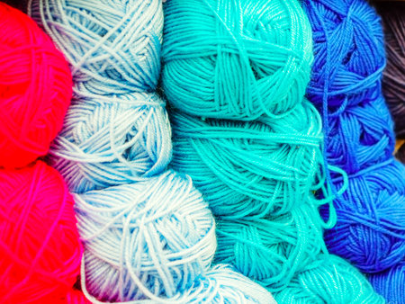 Woolen yarns in light blue, turquoise and pink. Photo in close-up full screenの写真素材