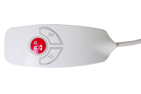 Medecian remote with buttons on a white background to call a doctorの写真素材