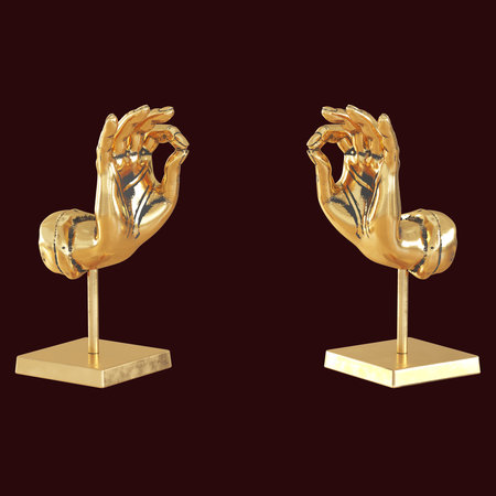 Two golden hands on stands show the ok gesture with their fingers on a burgundy background. 3d renderingの写真素材