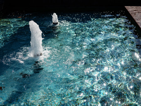 Simple little fountain with blur background in the evening