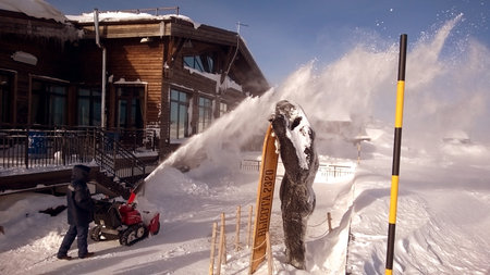 Russia, Sochi 23.01.2019. A worker cleans the snow with a Rosa Khutor snowplowのeditorial素材