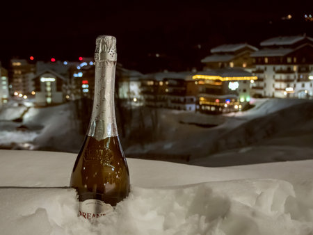 Russia, Sochi 23.01.2019.Bottle of champagne in the snow at Rosa Khutor in Sochi in winterのeditorial素材