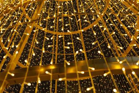 Golden string lights forming dome structure.