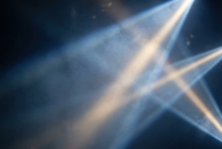 Dynamic light rays through atmospheric smoke.の素材