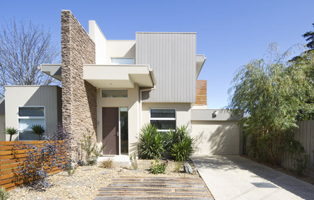 Front of a two storey contemporary architect designed townhouse home Front of a two storey contemporary architect designed townhouse home