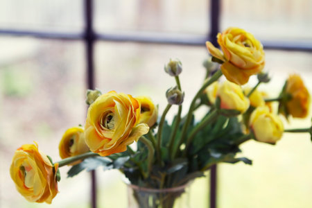 Close up of fake yellow flowers roses horizontal