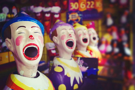 Close up of a laughing clown at the fairgroundの写真素材