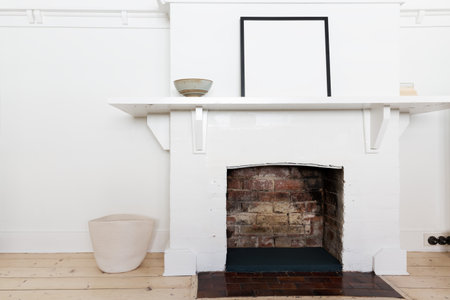 White brick fire place in vintage styled living room interiorの写真素材