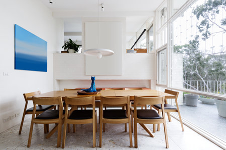 Beautiful scandinavian style dining room in mid century modern Australian homeの写真素材