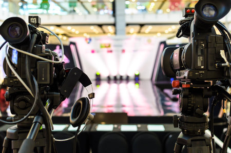 Video Camera has focus to the showing on  the stage for broadcasting and recording.の写真素材